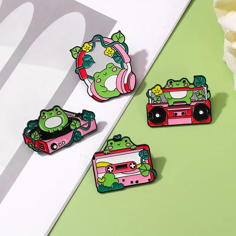 Broches amantes de música sapo
