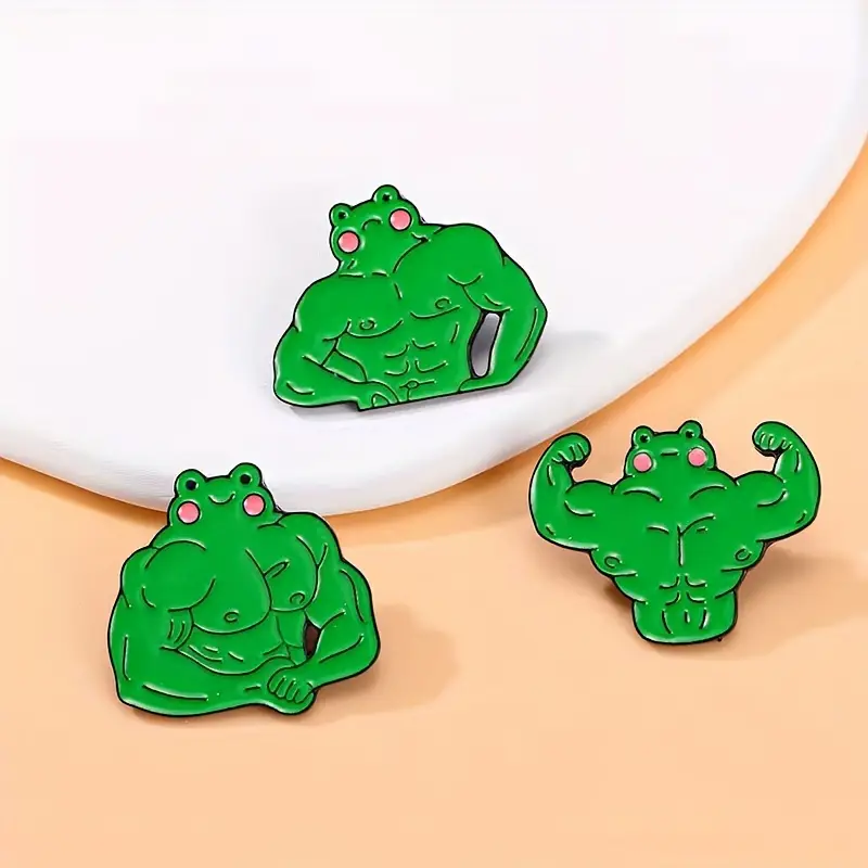 Broches divertidos de sapos musculosos