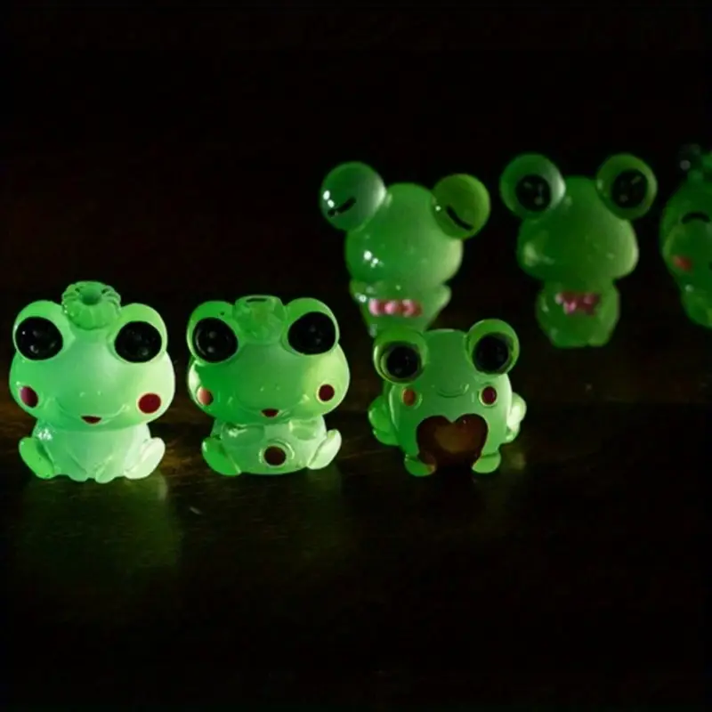 Peças decorativas de sapinhos luminosos