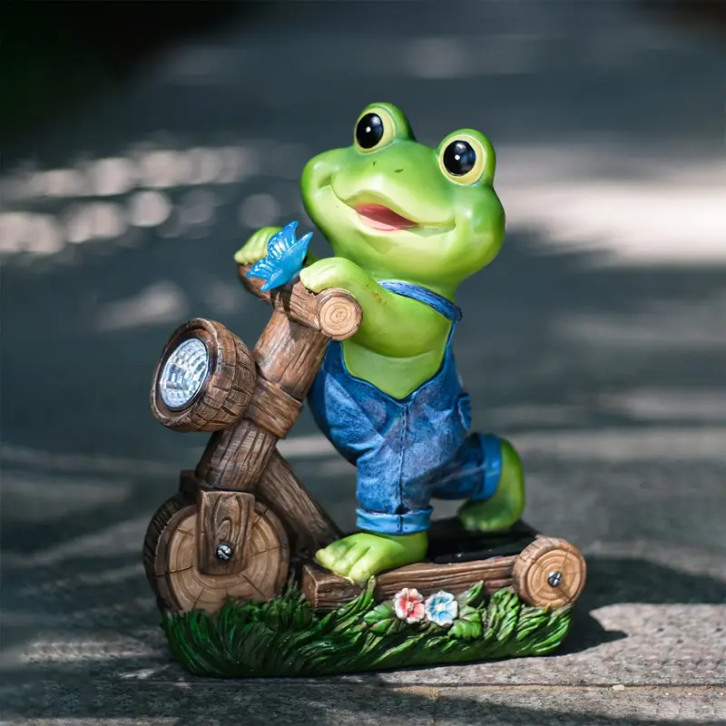 Sapo montado na bicicleta