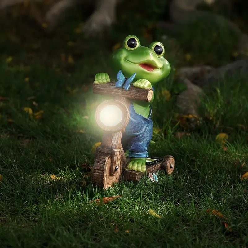 Sapo montado na bicicleta