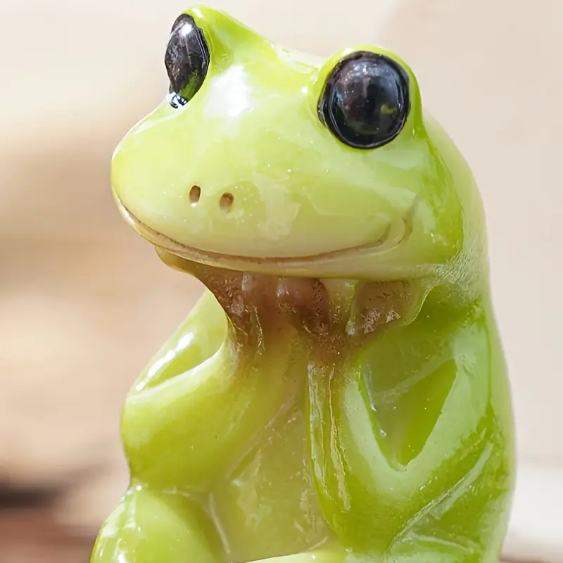Sapo sentado na privada
