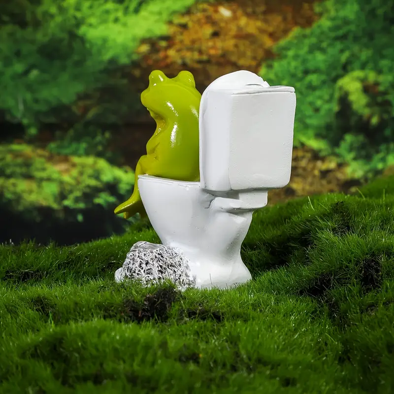 Sapo sentado na privada