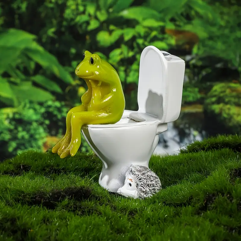 Sapo sentado na privada