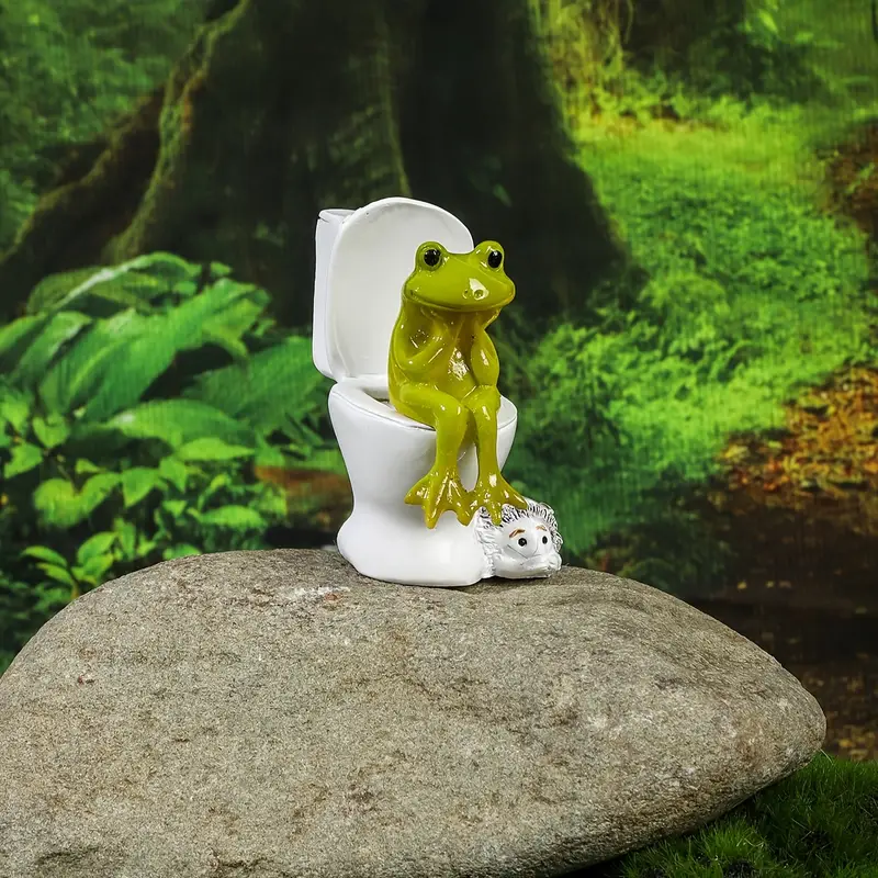 Sapo sentado na privada
